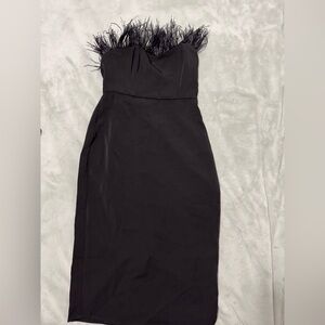 Black dress with feathers